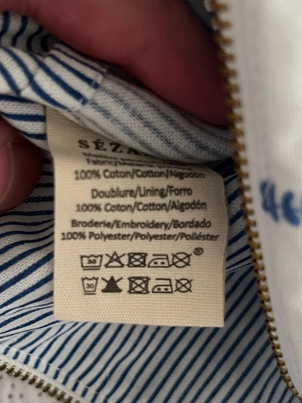 Sezane white and blue embroidery zip makeup bag